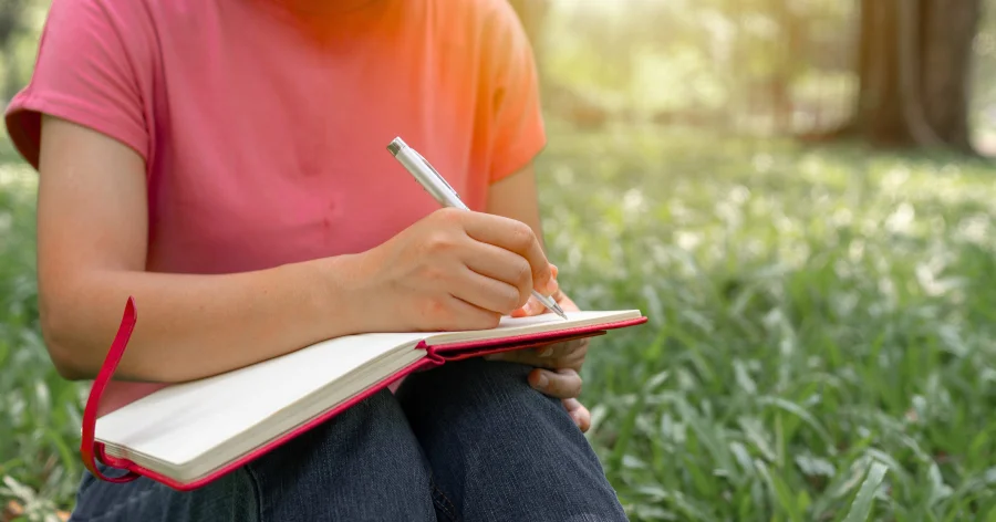 a girl writing a note